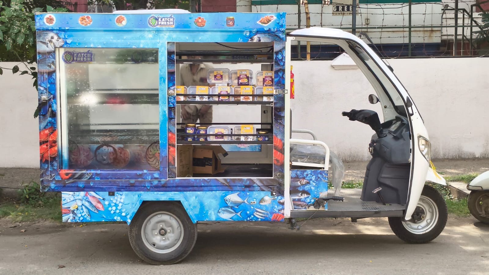 KatchFresh branded market vehicle with seafood display