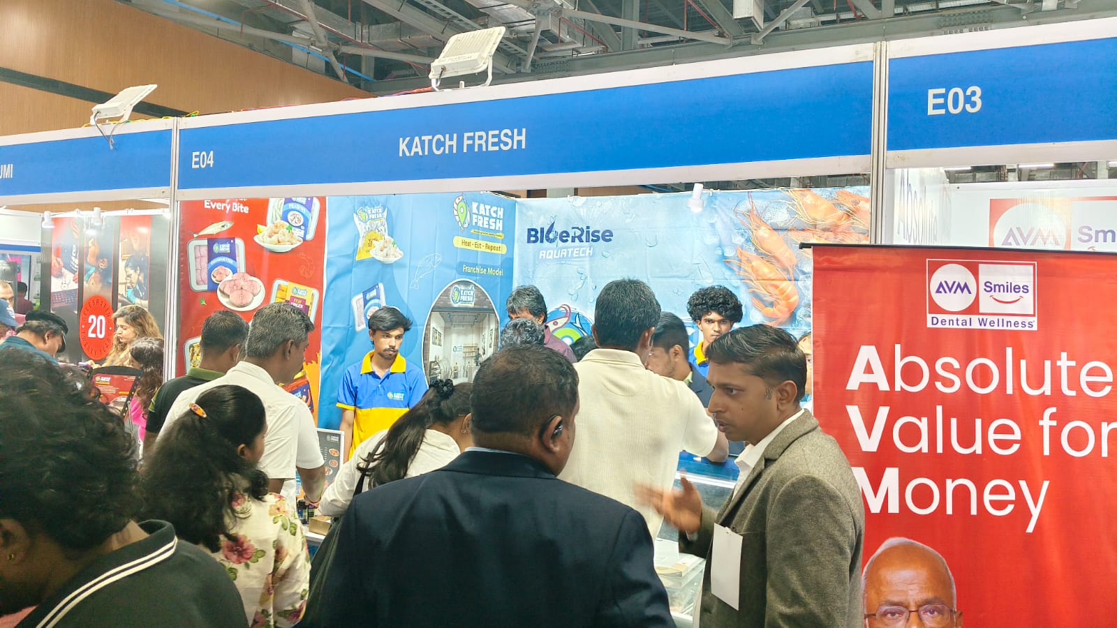 Visitor interaction at KatchFresh Franchise India Expo stall