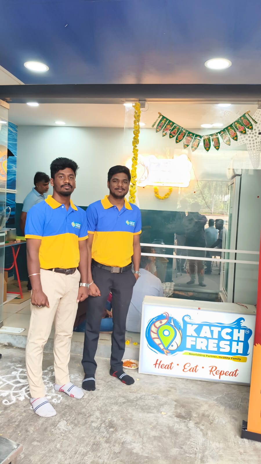 KatchFresh store team in uniform